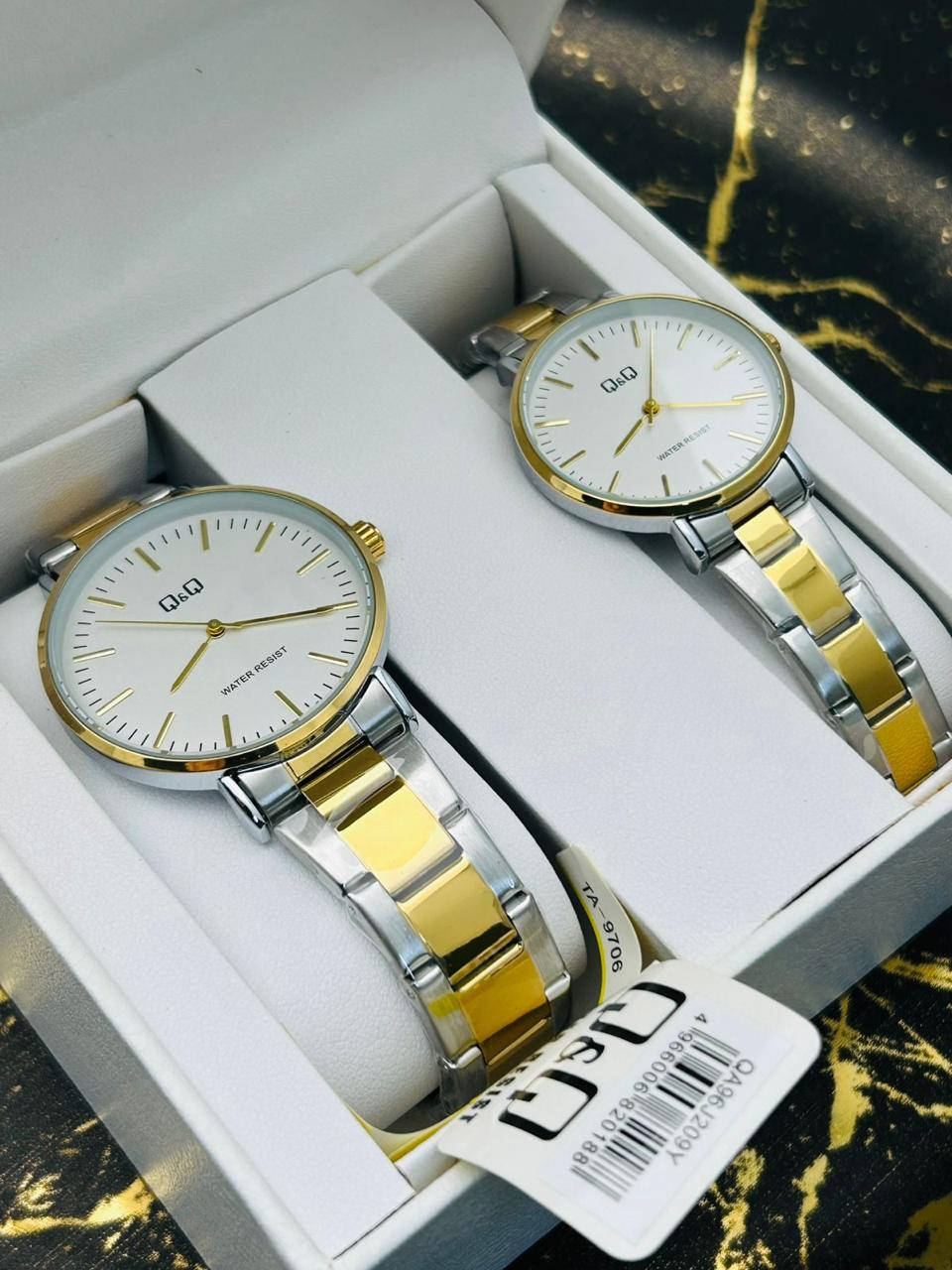 Pareja de relojes Q&Q