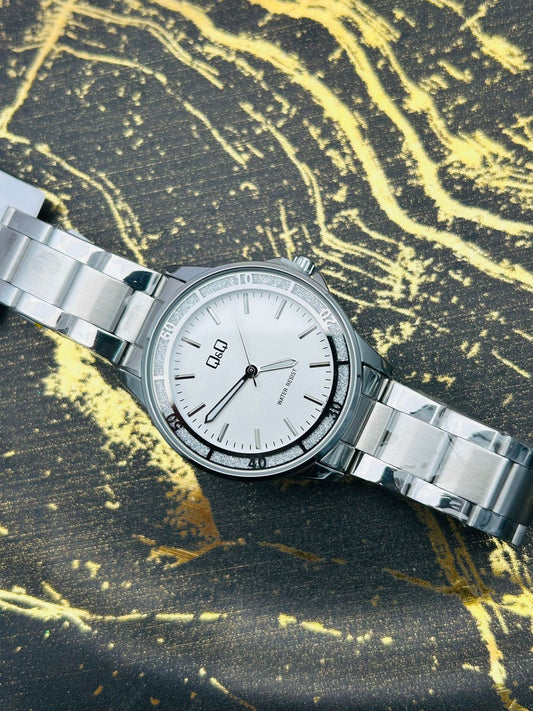 Reloj Q&Q para dama fondo color